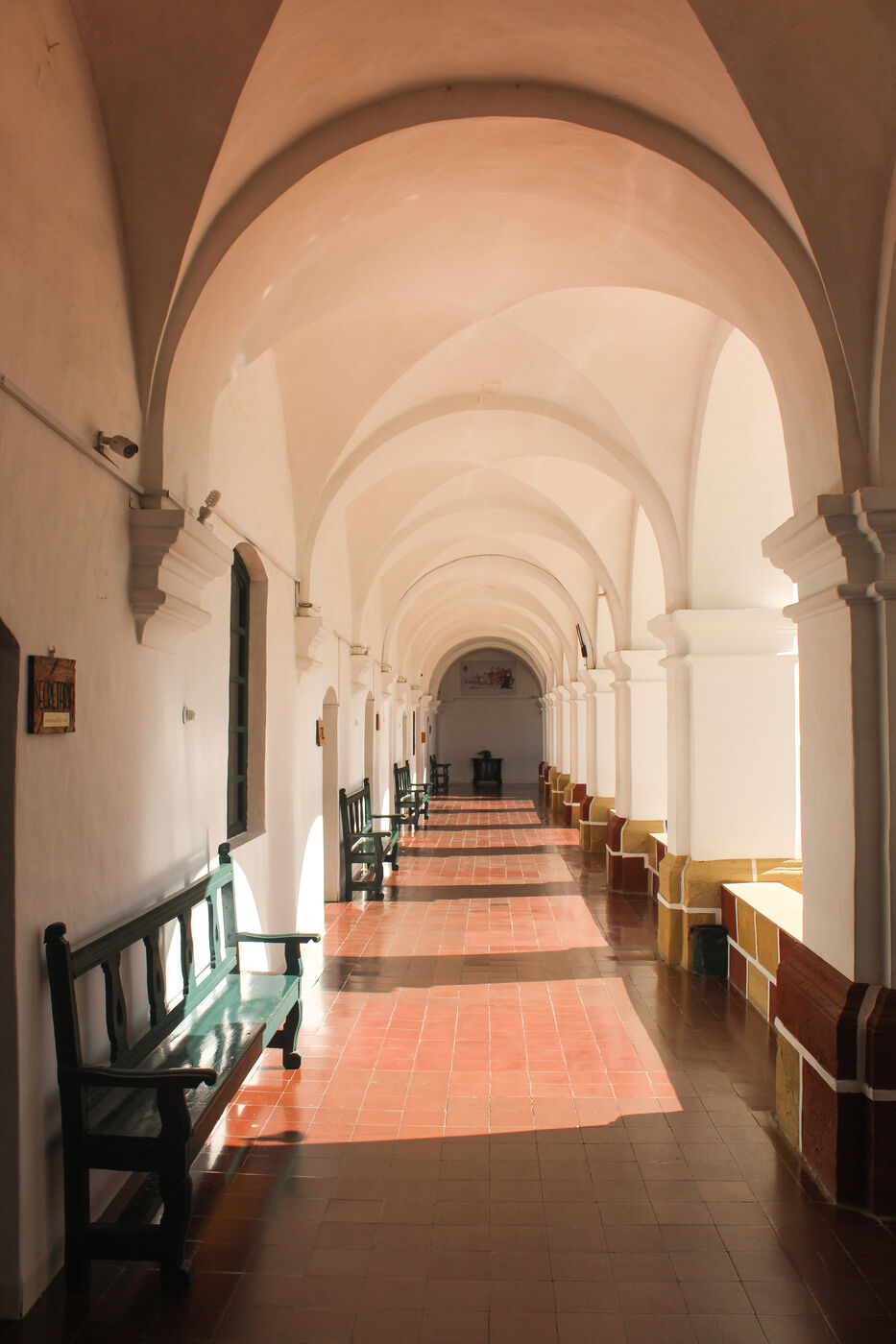 Sunlit abbey hallway